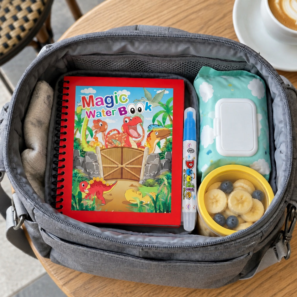 A water book and pen tucked in a changing bag